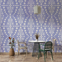 The image features detailed, artistic motifs and filigree.
