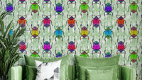 Kids’ room with rainbow bug-themed wallpaper

