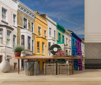 Peel and stick covering Rainbow Row Houses colorful wallpaper.
