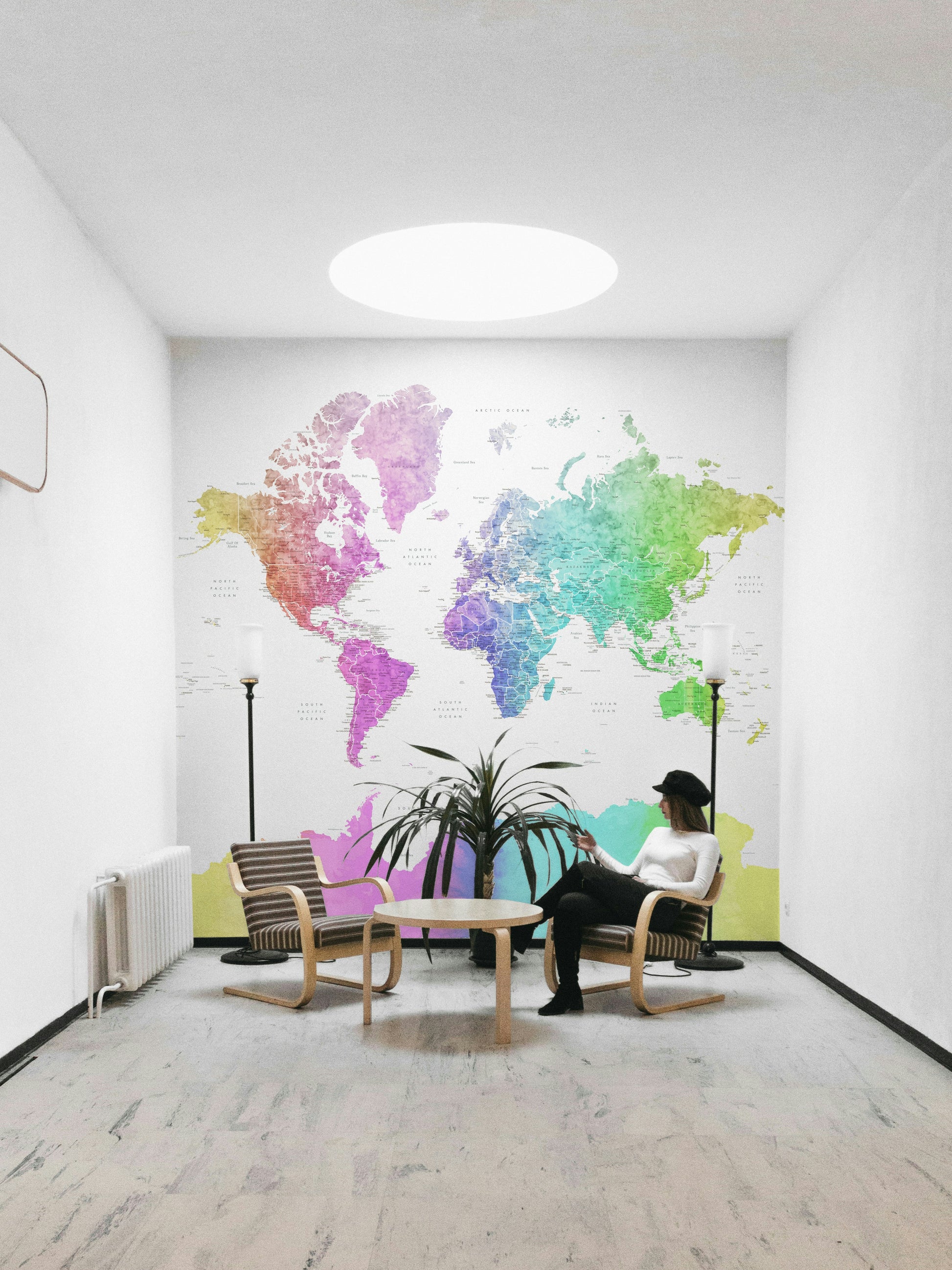 Educational wall mural with colorful world map design

