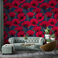 Striking red poppies on a dark blue floral wallpaper design

