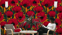 Red poppies on orange wallpaper creating a bold statement

