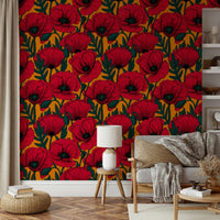 Red flowers on orange wallpaper adding warmth and energy

