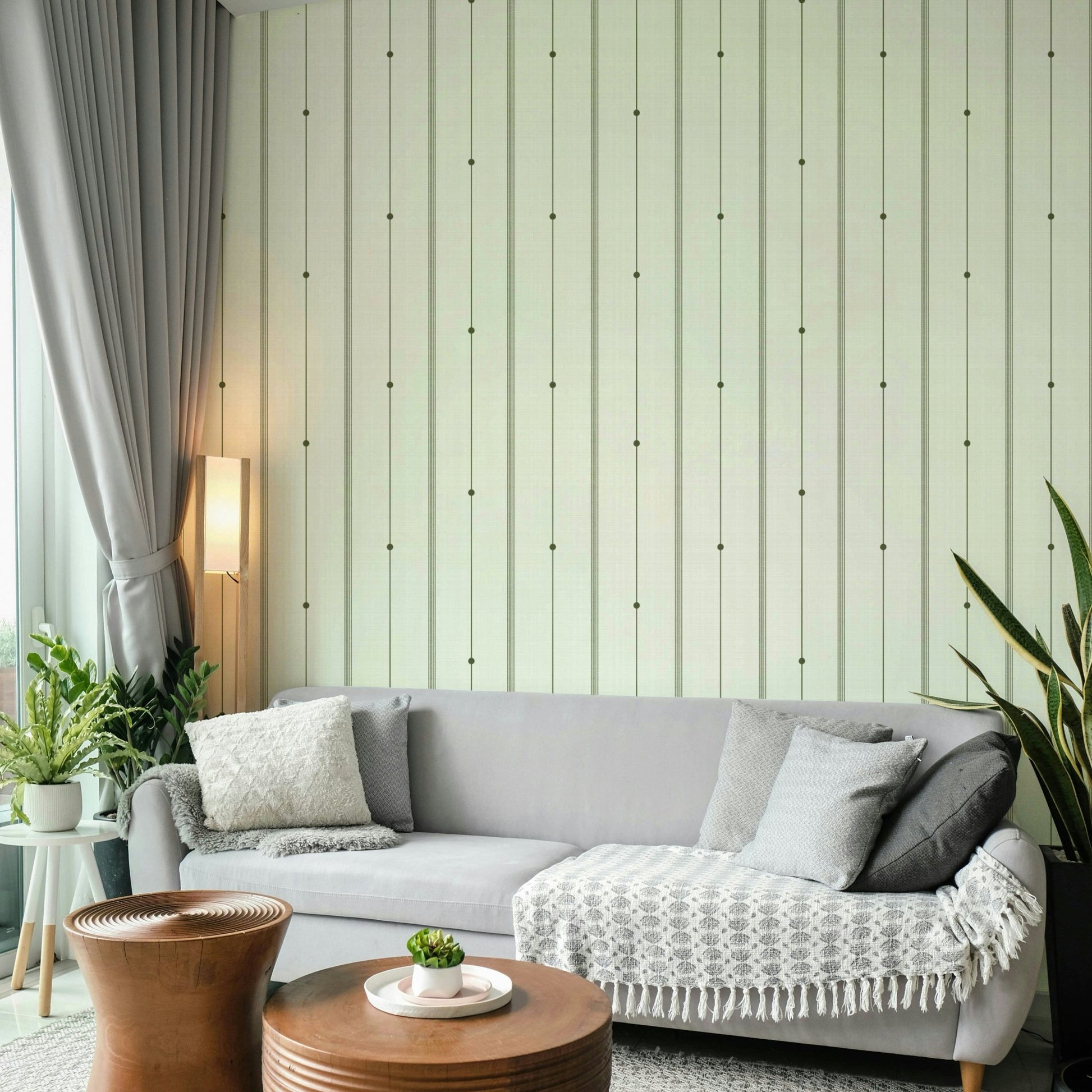 Buttercream and olive striped wallpaper creating a sophisticated atmosphere

