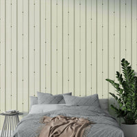 Refined buttercream and olive wallpaper adding elegance to rooms

