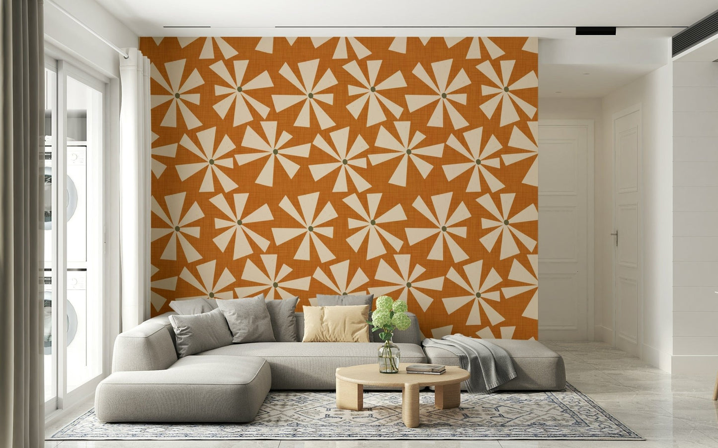 Playful starburst floral wallpaper with cream bursts on a rich burnt orange field.