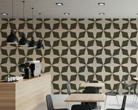 Wallpaper for walls with large-scale geometric flower shapes.