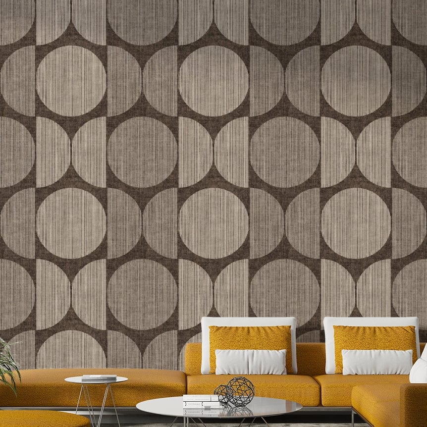 A graceful subtle circle wall mural in cool, earthy tones.

