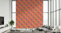 A colorful grid-style wallpaper with bold squares and whimsical eyes creating a quirky retro look.