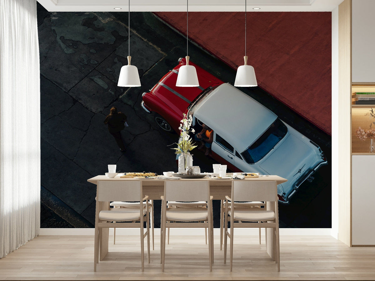 Classic Ride, Modern Style wallpaper mural of red and blue retro cars seen from above behind a wood dining table and chairs