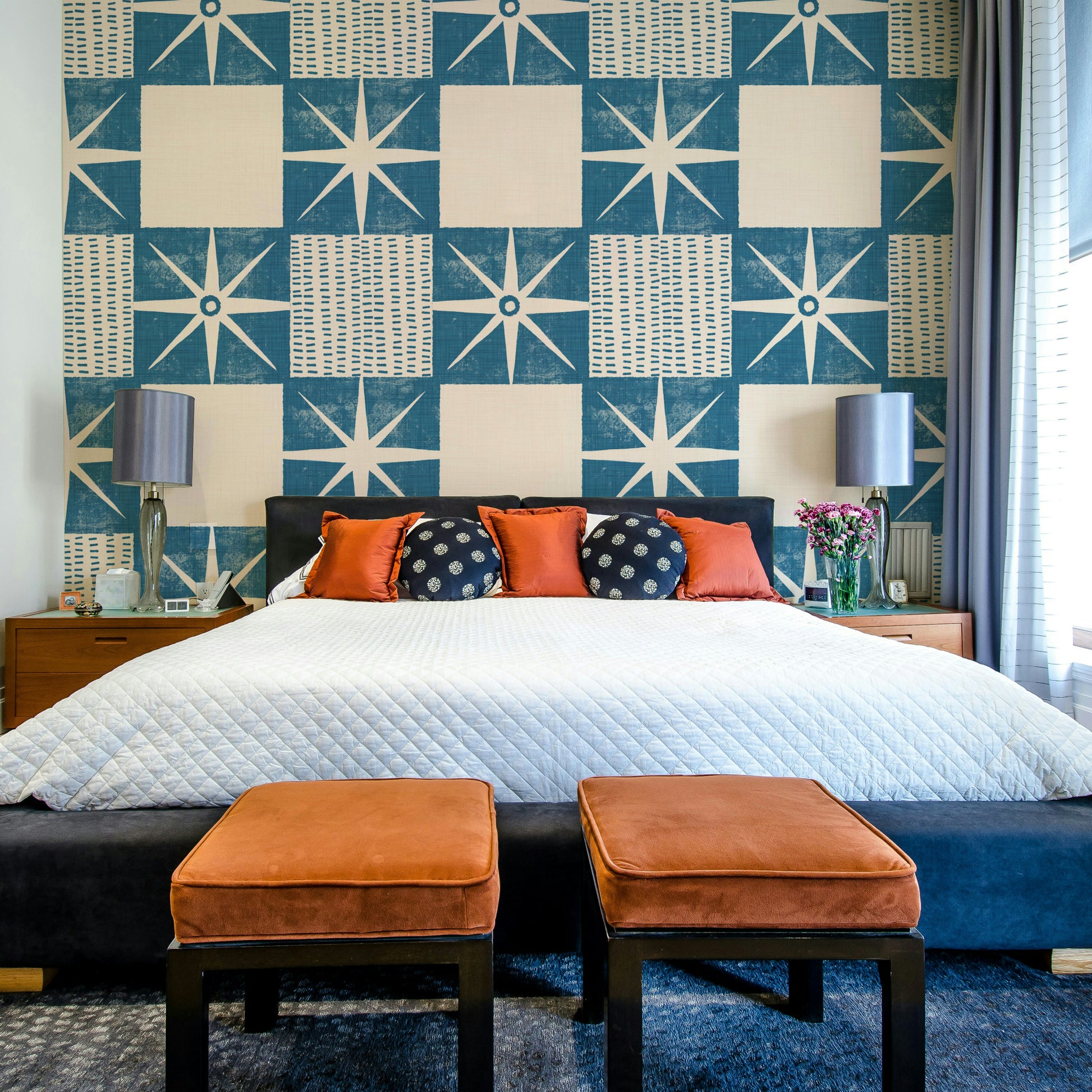 Minimalist indigo wallpaper with starburst quilt design

