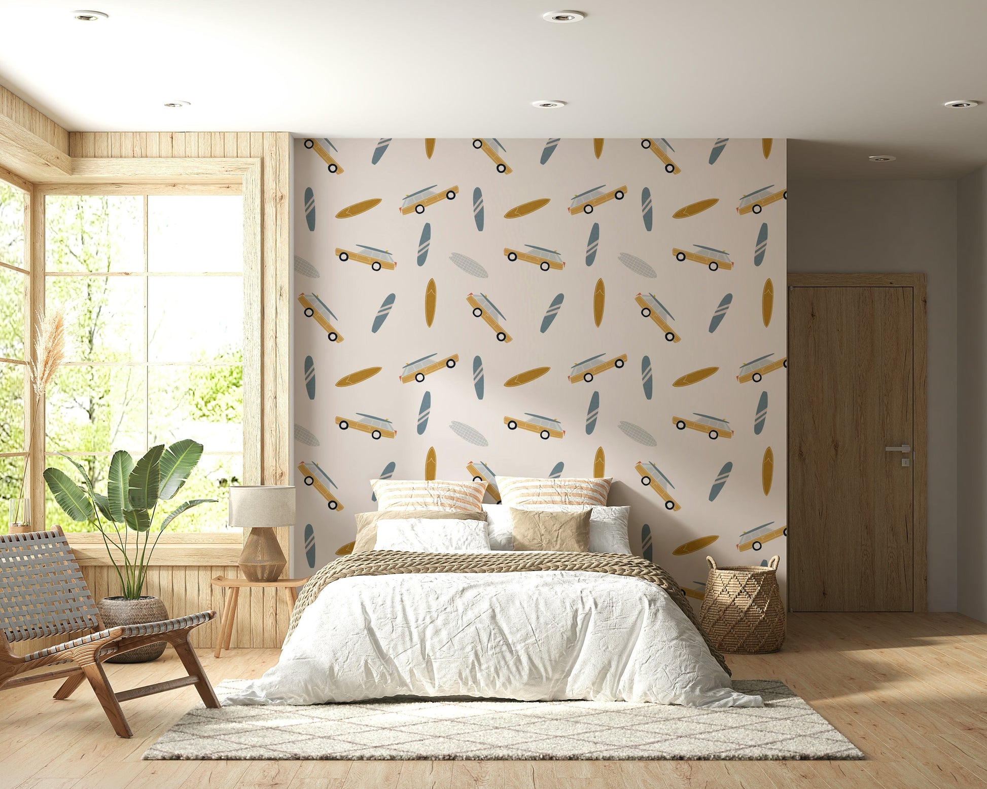 Coastal wallpaper decorated with whimsical surfboards and small illustrated road-trip cars.