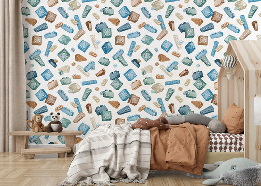Retro Toy Blocks wallpaper with watercolor blue, green and brown building bricks behind a house-frame toddler bed in a kids room