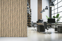 A cream wallpaper decorated with repeating vertical vines and bold outlined retro-style leaves.