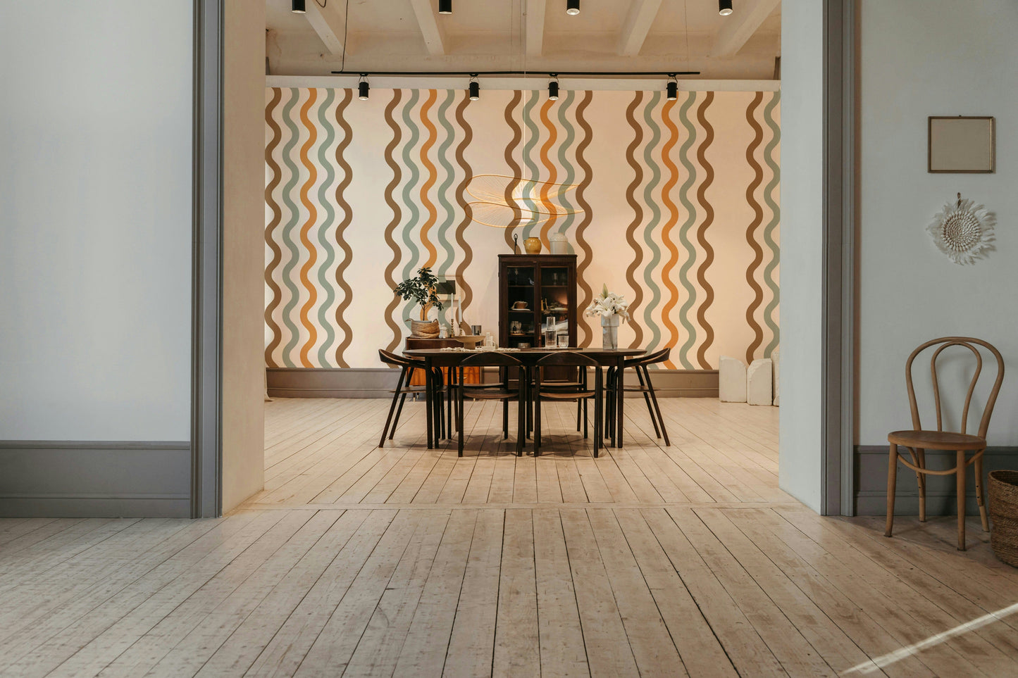 The design features a repeating pattern of soft, undulating lines.

