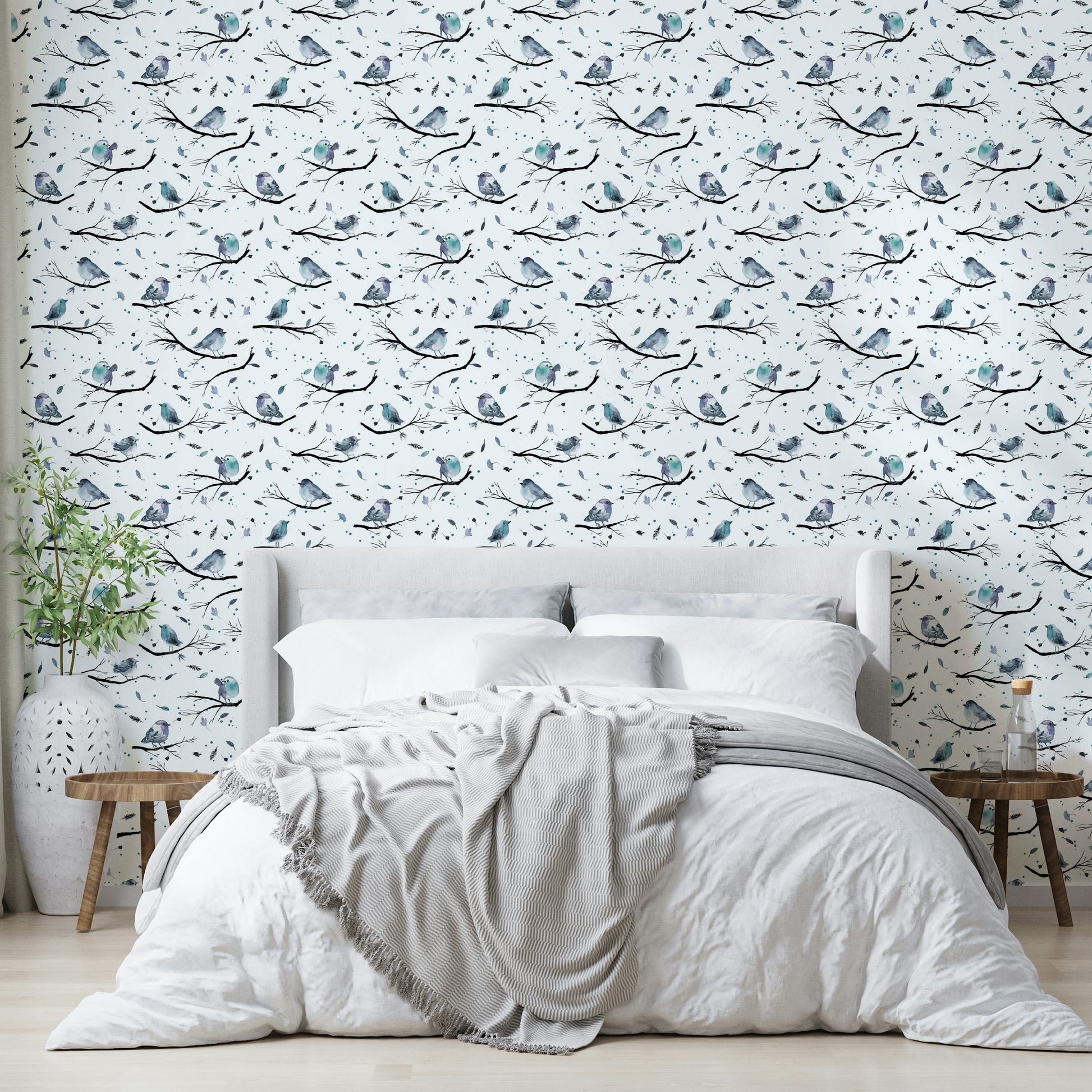 Soft blue wallpaper with woodland bird design

