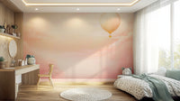 Dreamy pink cloud mural used as a backdrop in a photography studio.
