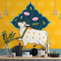 Hindu temple cow painting with sacred handprints
