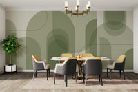 Arched architectural elements in sage green.

