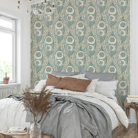 Pale aqua and teal patterned wallpaper for a master bedroom suite.