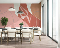 Abstract sandy waves in warm blush hues creating a soft, minimalist wallpaper design.