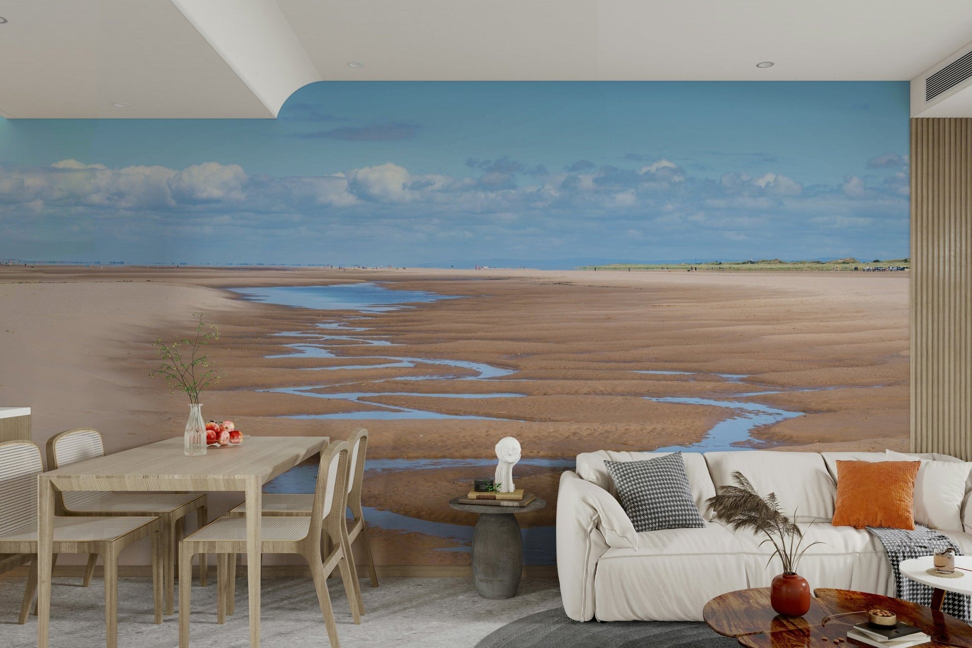 Calm beach wall mural with soft clouds and winding tide lines.

