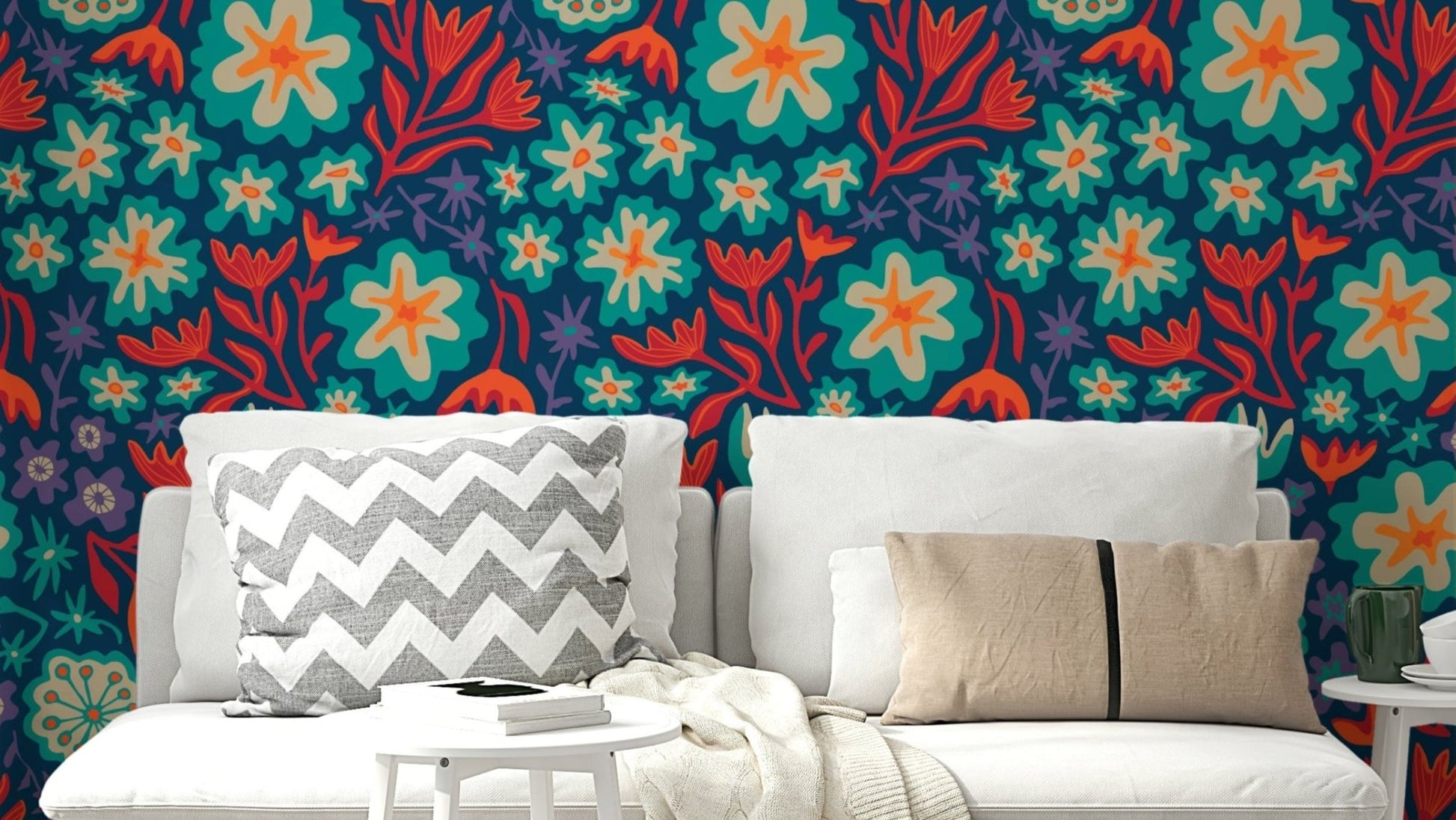 Bright aqua, orange, red, purple, and dark blue tropical flowers on a wall.

