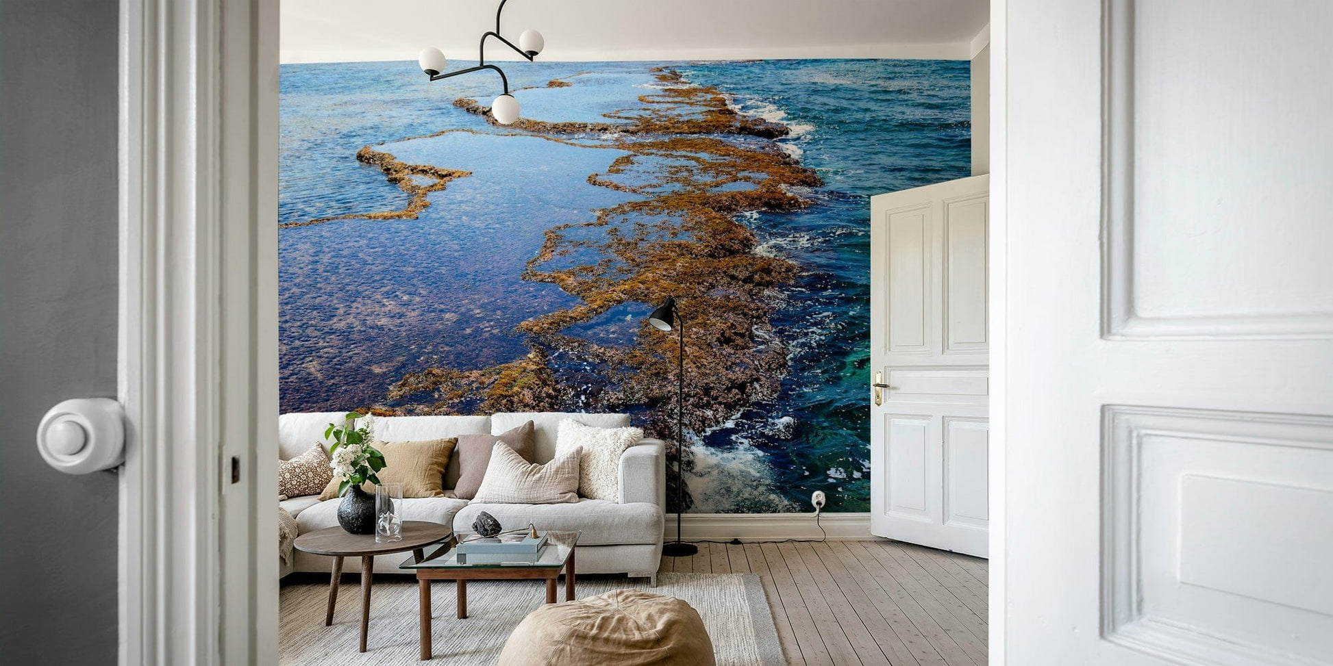 A calming sandy beach wallpaper mural that defines a space.

