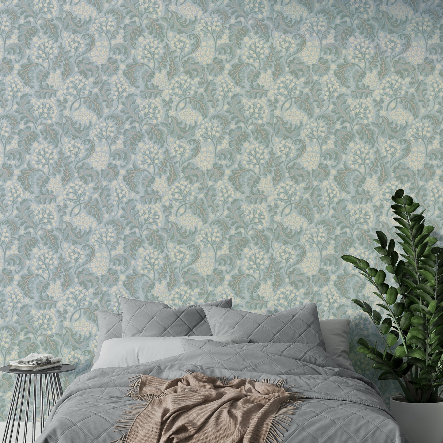 Baby blue wallpaper with flowing plant pattern

