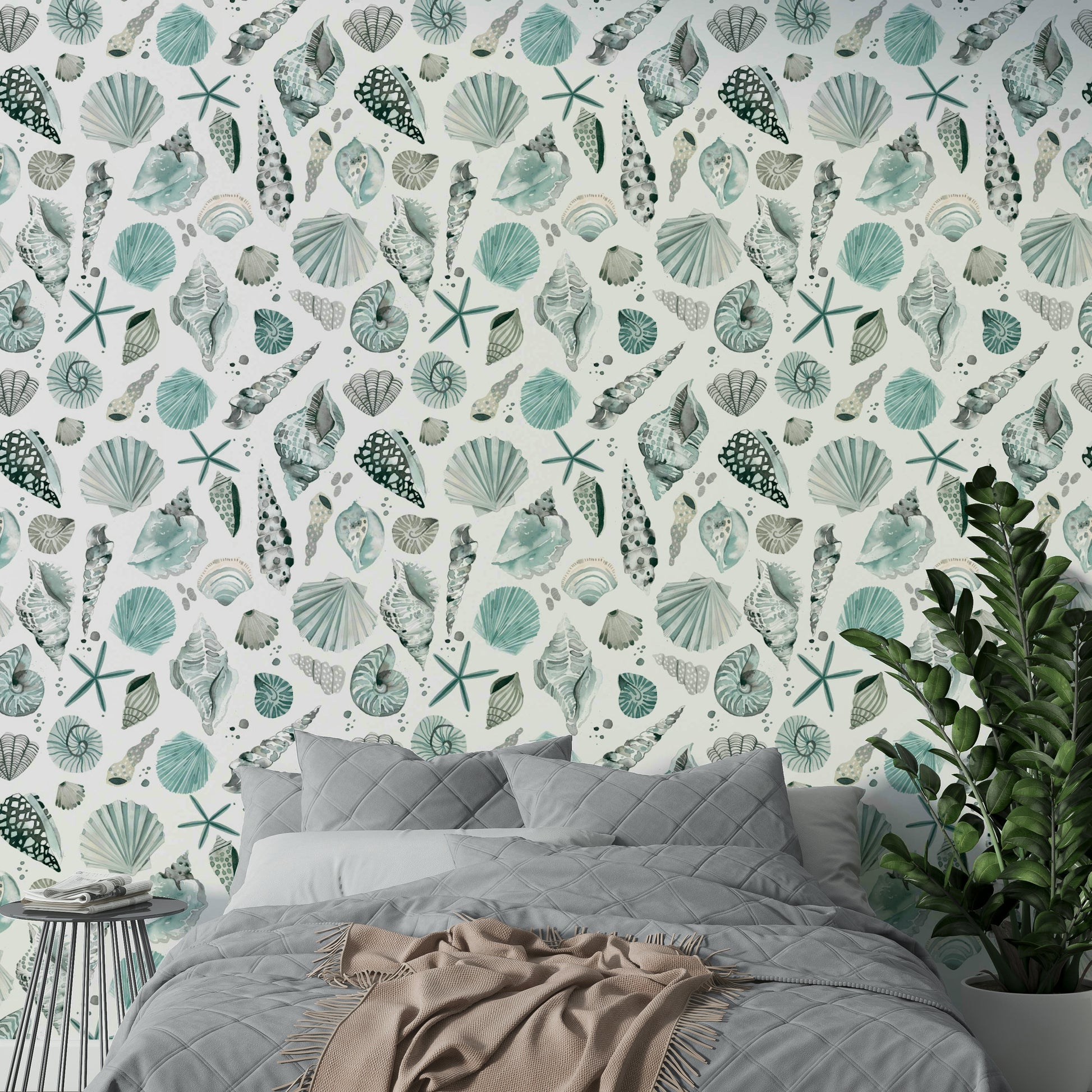 Beach-style wallpaper with watercolor blue seashell illustrations.

