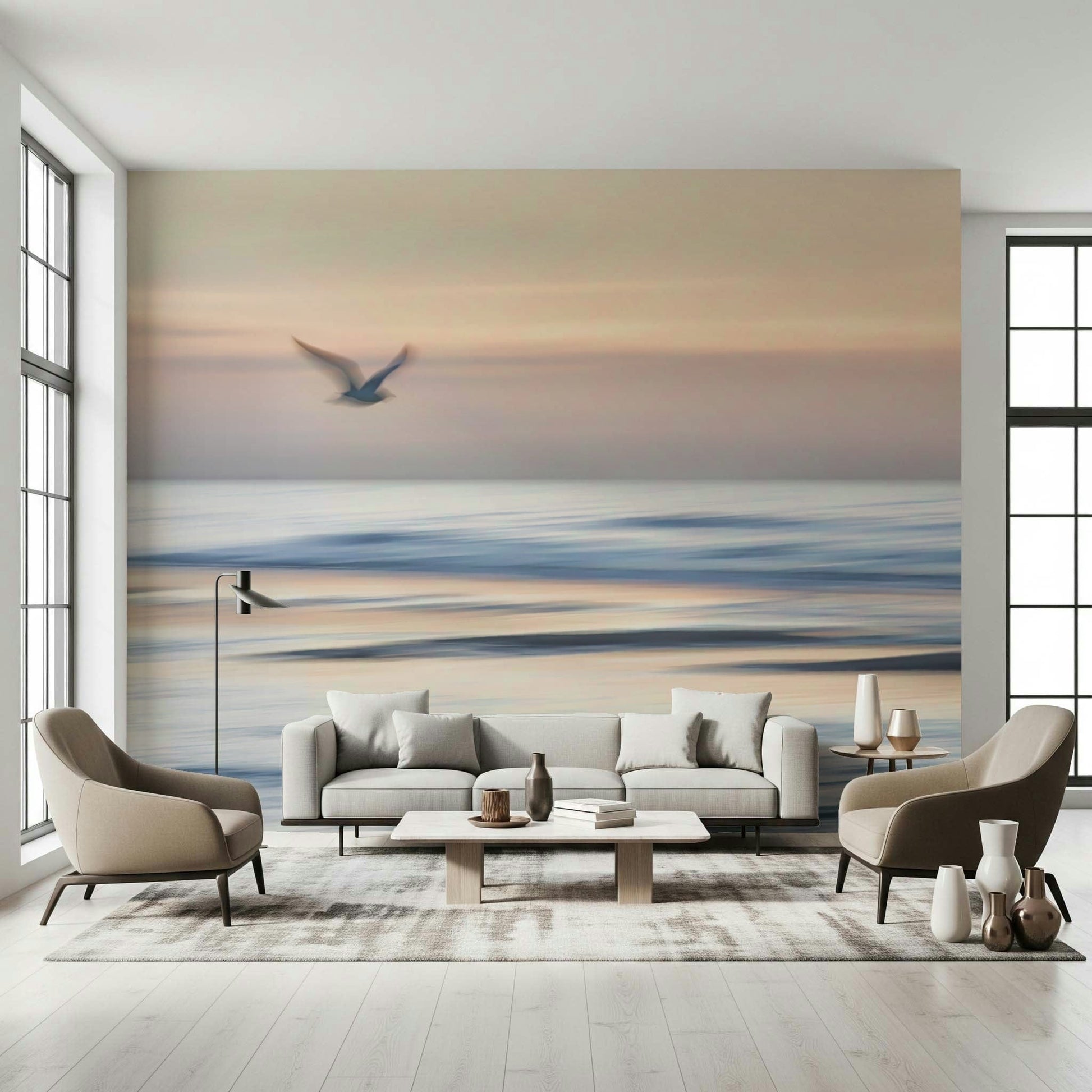 Coastal seagull wallpaper in bedroom, neutral bedding, light blue color palette, feature wall