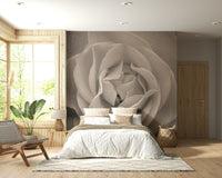 Artistic floral mural highlighting the texture and curves of a sepia-toned rose.