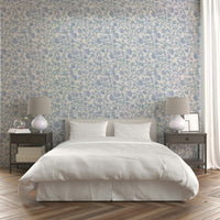 Serene floral print wallpaper in light blue hues

