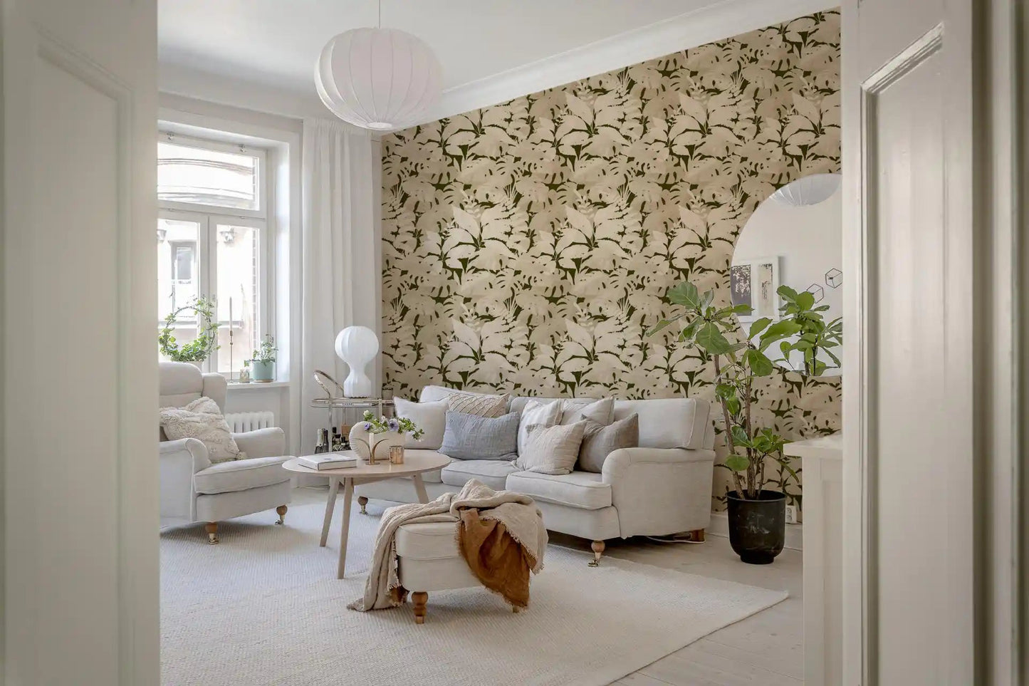 Repeating botanical leaf wallpaper in beige and olive green tones