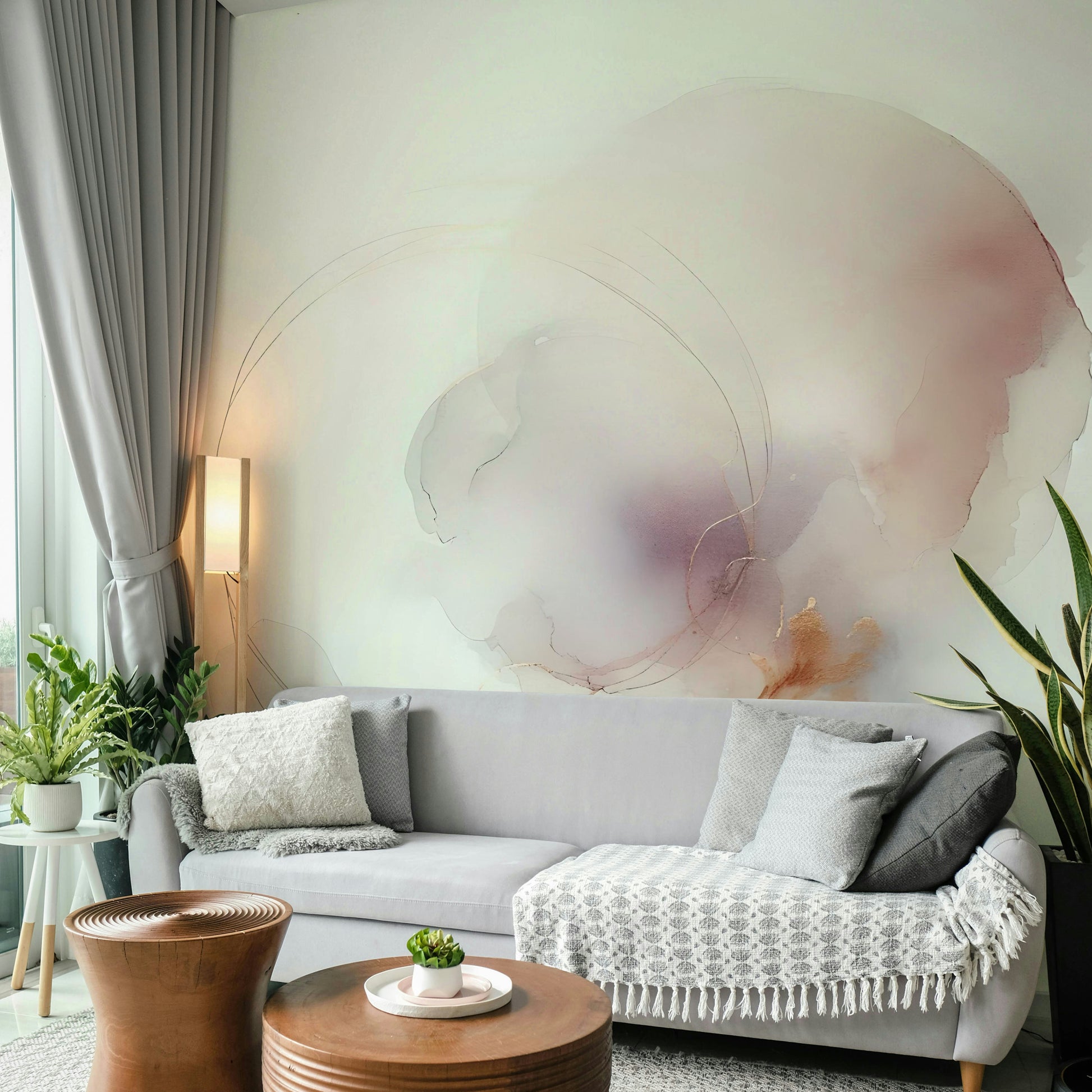 Serene Drift Wall Mural behind a modern gray sofa in a home library.