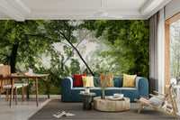 Sunlight filtering through dense leaves in a wall mural.

