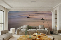 A peaceful coastal vista mural on decorative wallpaper.

