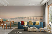 Serene Sunset Pier wall mural with golden hues

