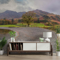 Calm water reflecting mountains.

