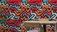 Vibrant colorful graffiti seamless wallpaper for modern walls.