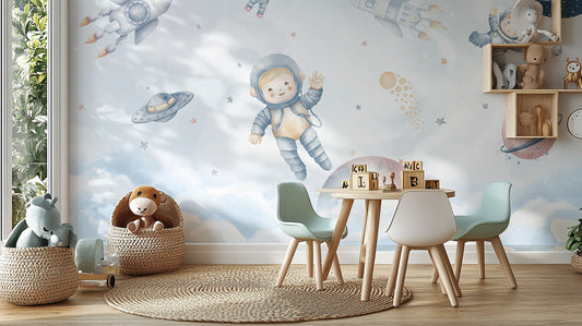 Space Adventure Kids wallpaper with astronaut, rocket and UFO above a kids play table with chairs and toy blocks