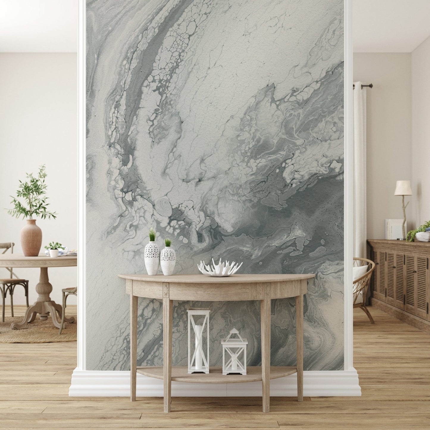 Textured mural with metallic silver swirl designs adding a sophisticated and artistic touch.