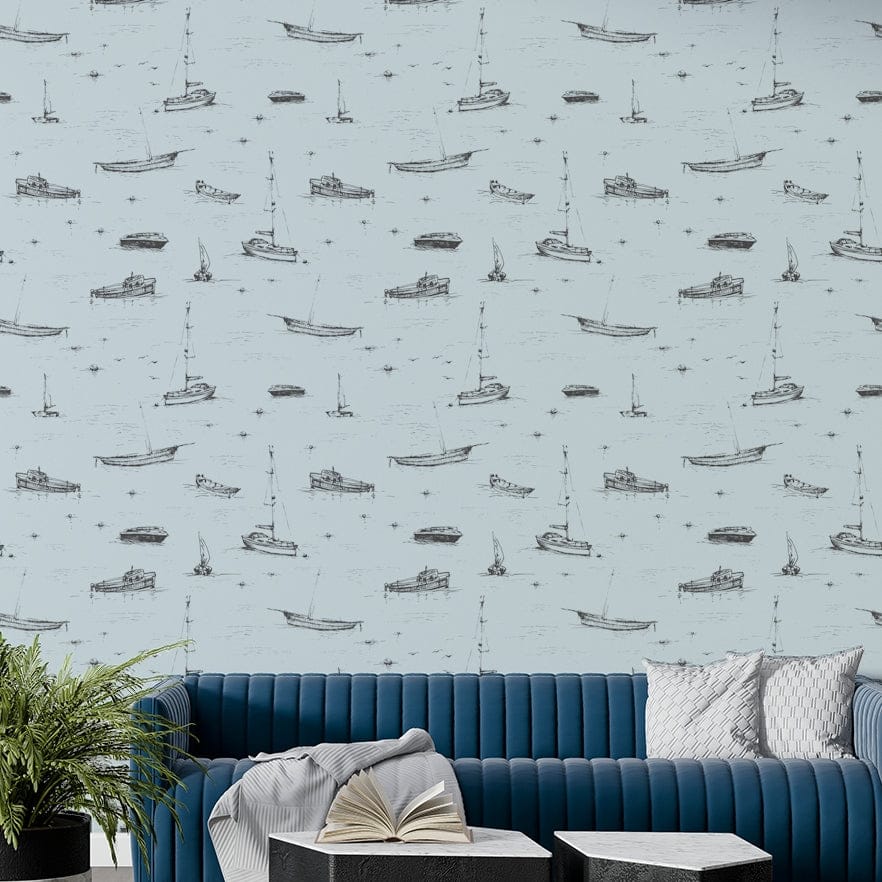 A full-wall mural showing a pattern of sketched boats.
