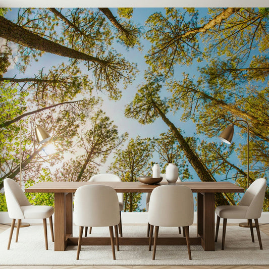 Skyward trees ceiling mural in modern bedroom, green canopy view above bed