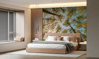 Upward trees mural in bedroom headboard wall, natural green and light