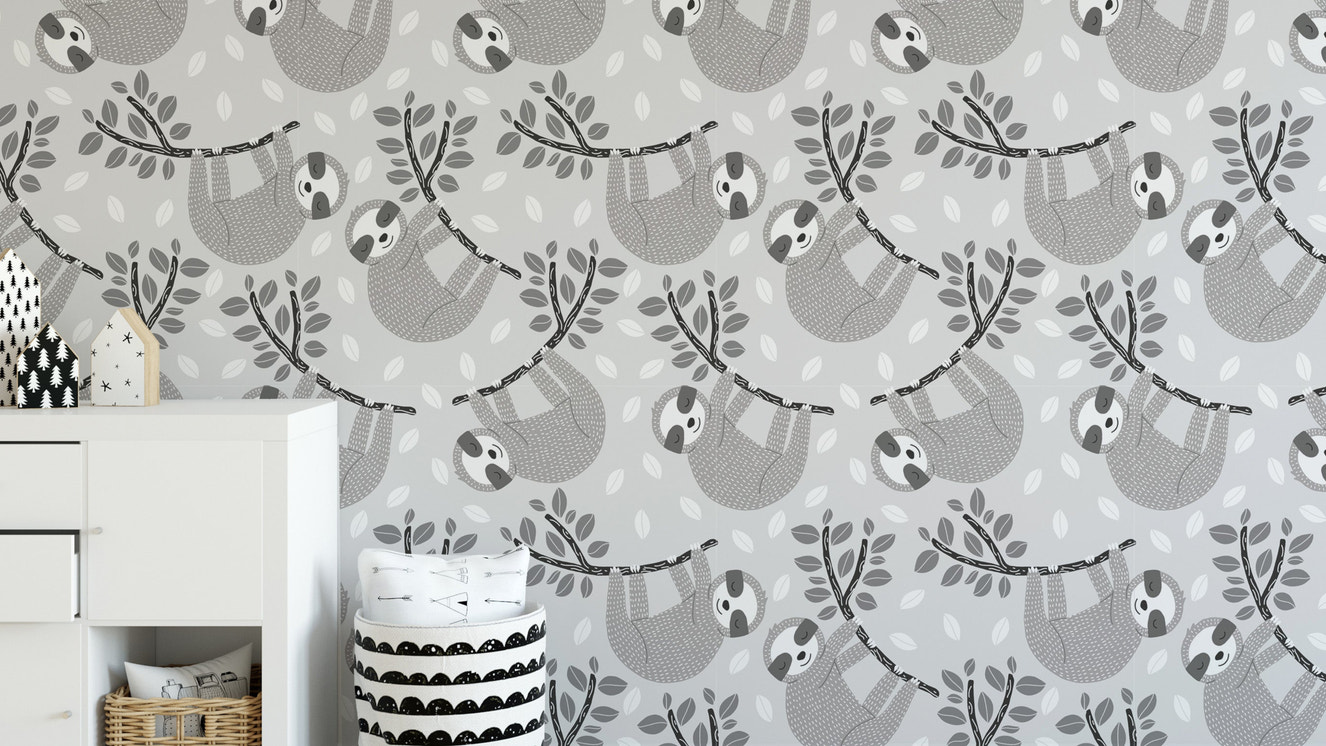 Sleepy sloths on leafy branches mural.
