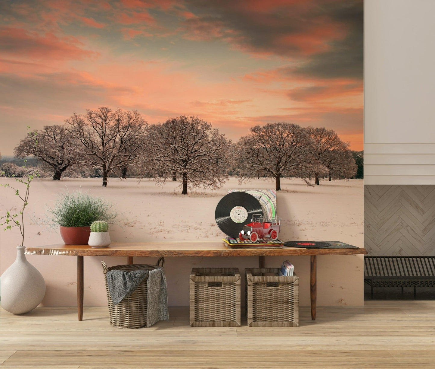 Snowy field wall mural with bare trees
