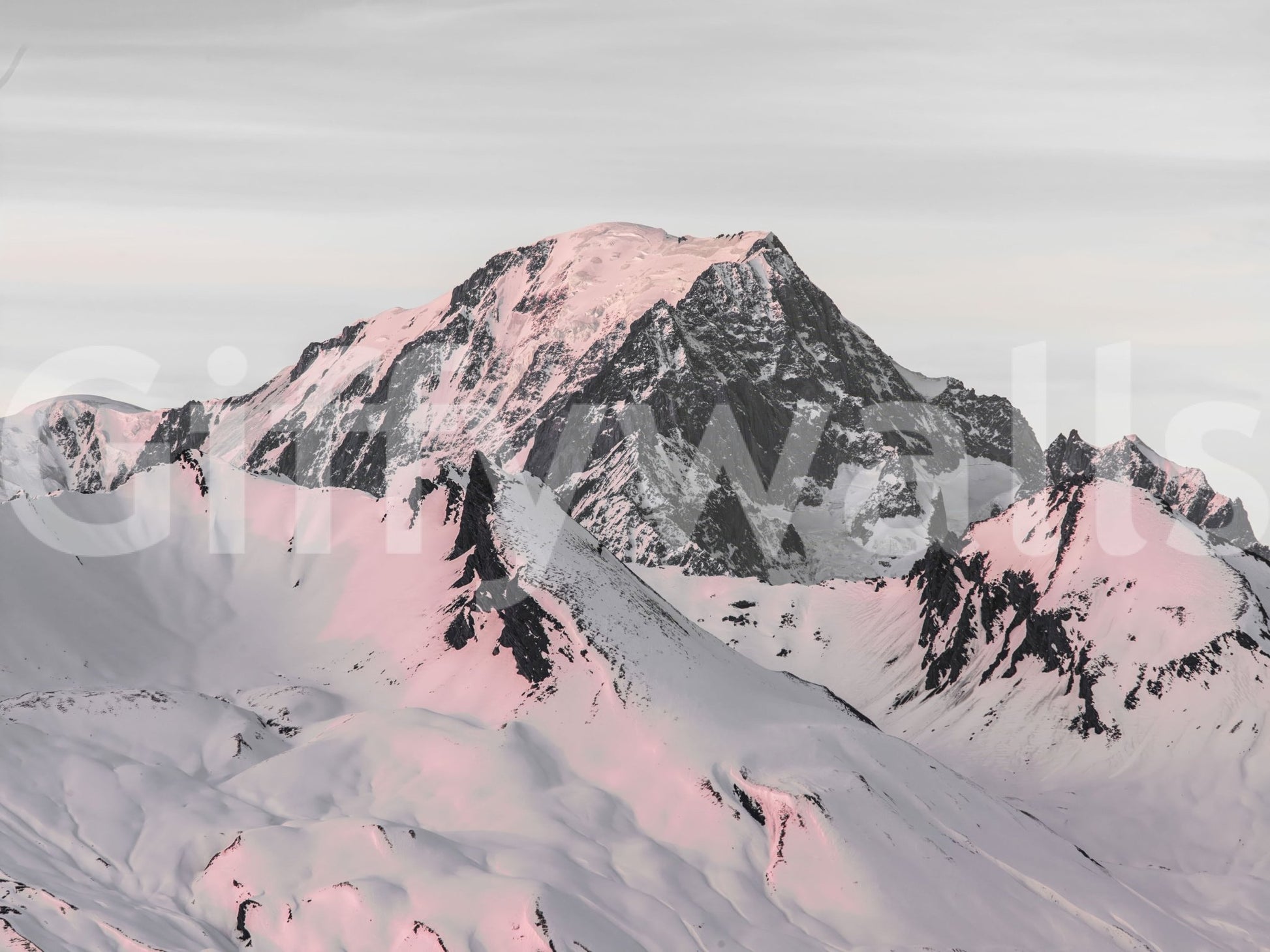 Stunning snow-covered mountain mural for creating a peaceful room.

