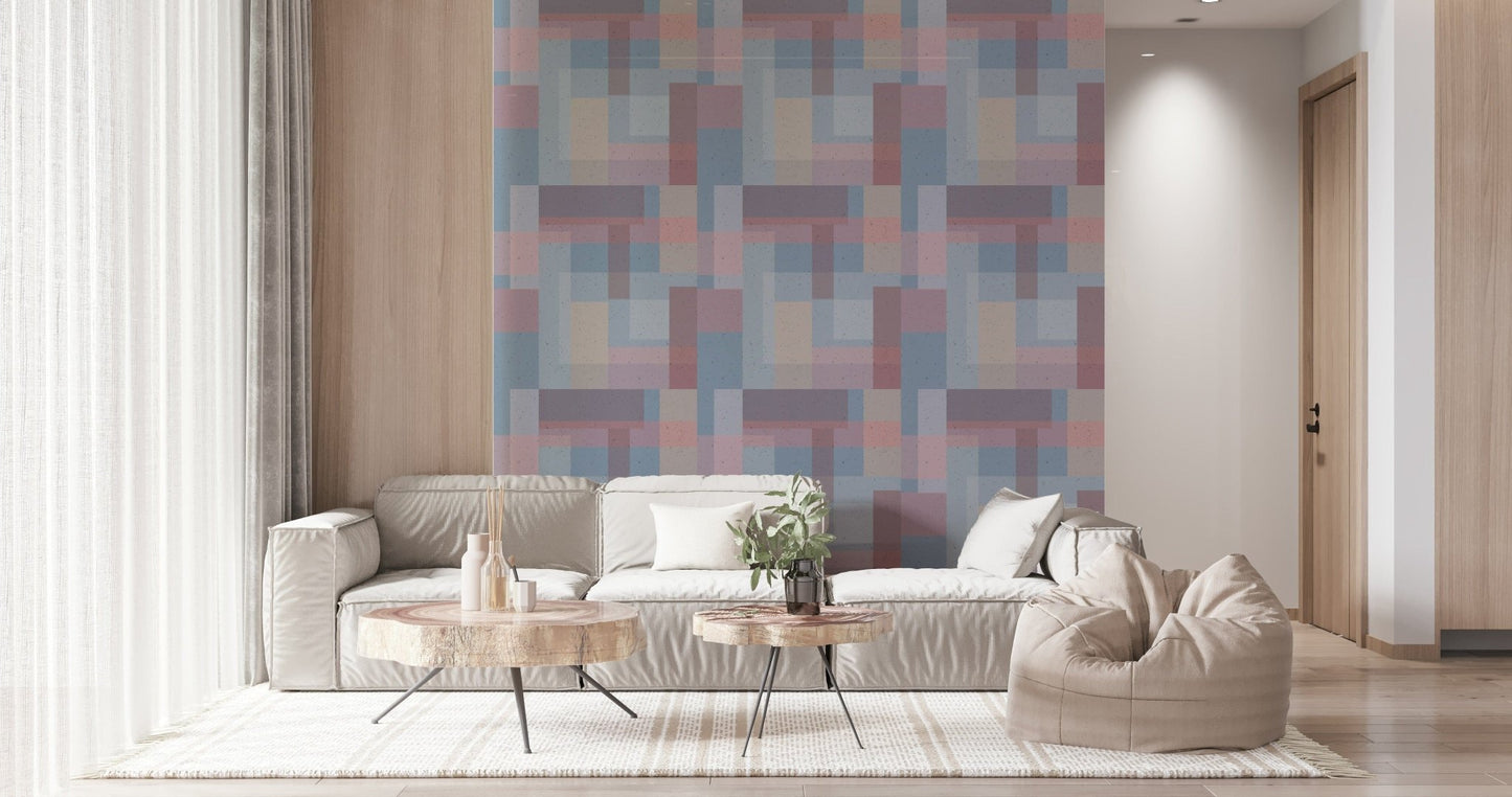 A repeating wallpaper pattern of soft rectangles in blended shades of blue, pink, and beige.