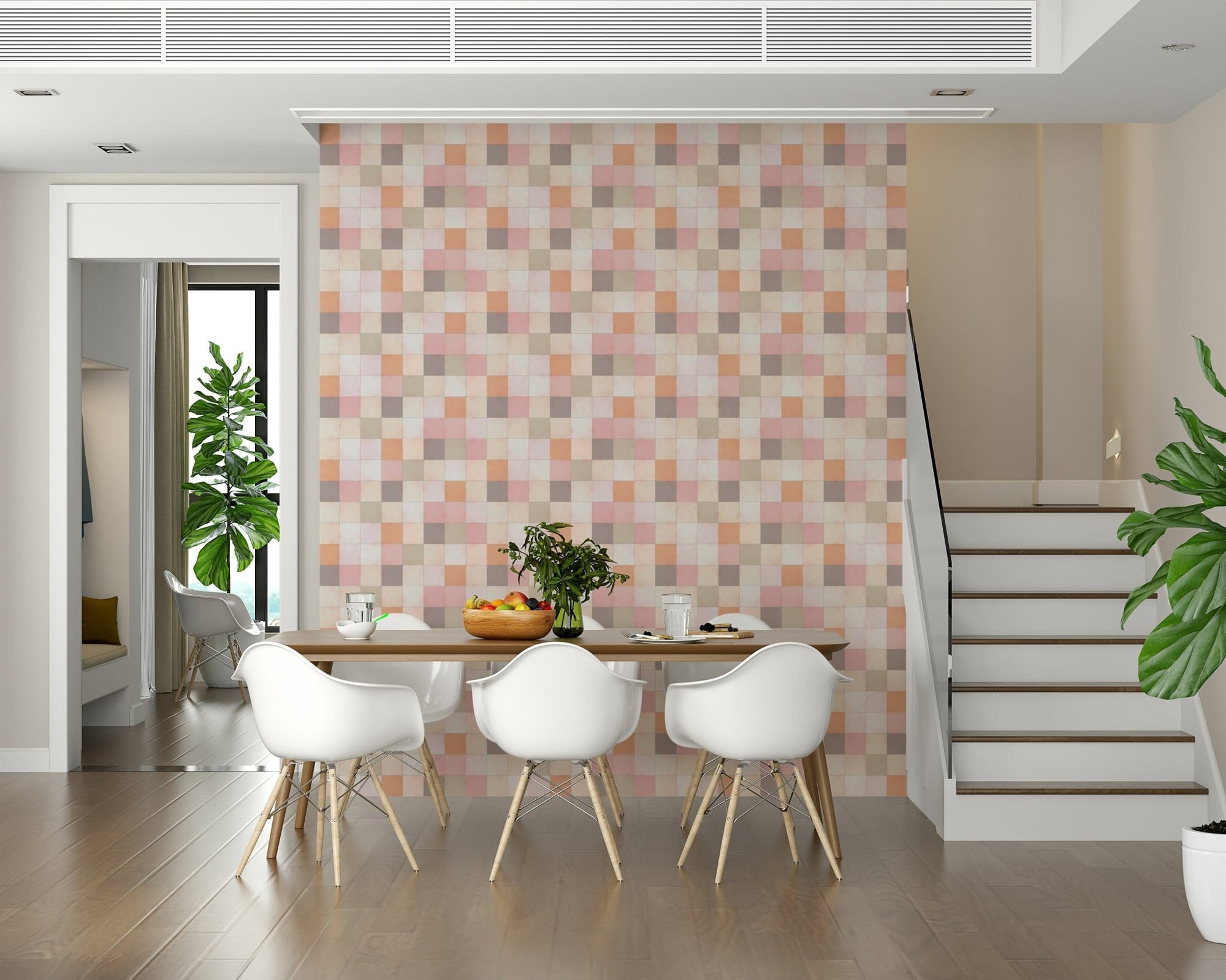 Soft Mosaic Tiles Peach Glow wallpaper in a dining nook with white Eames chairs beside a staircase